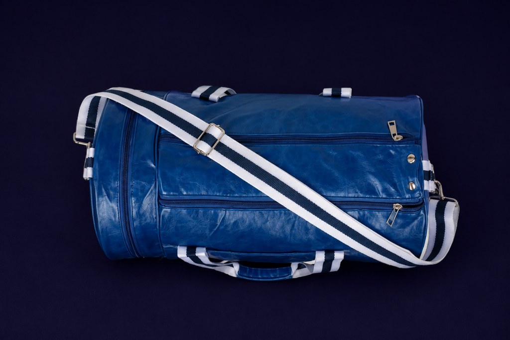 Neptune blue duffle bag top view with white and navy straps
